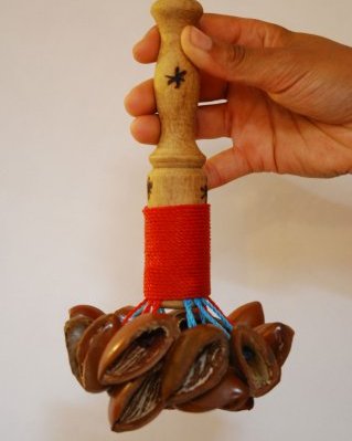 Ekpiri cluster rattle with stick