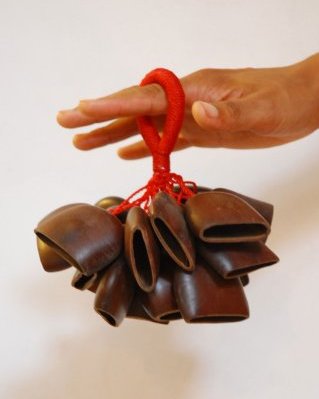 Entada cluster rattle with handle